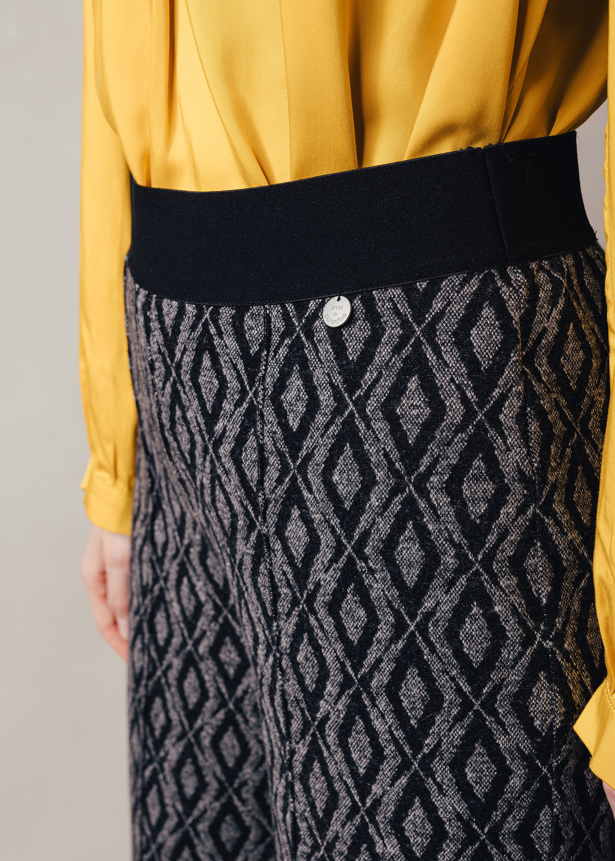 Jersey jacquard trousers with geometric pattern