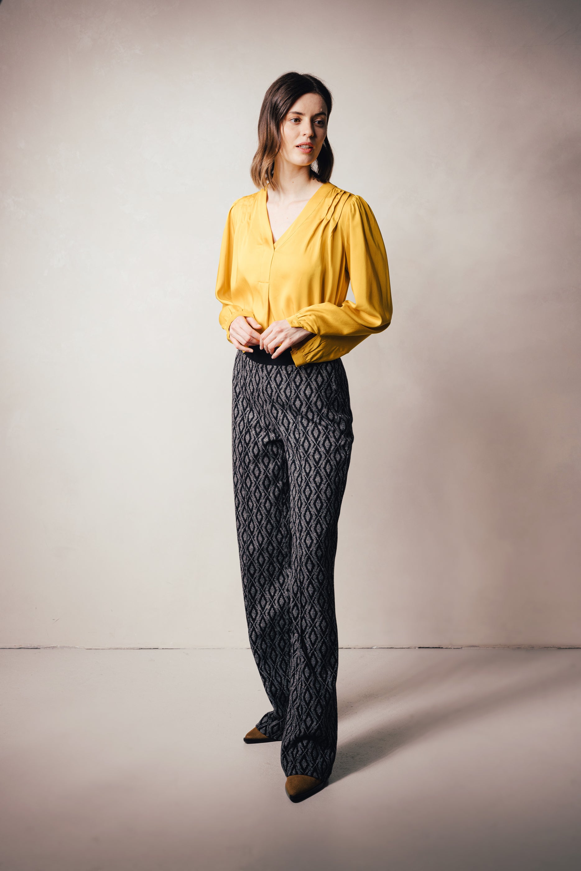 Jersey jacquard trousers with geometric pattern