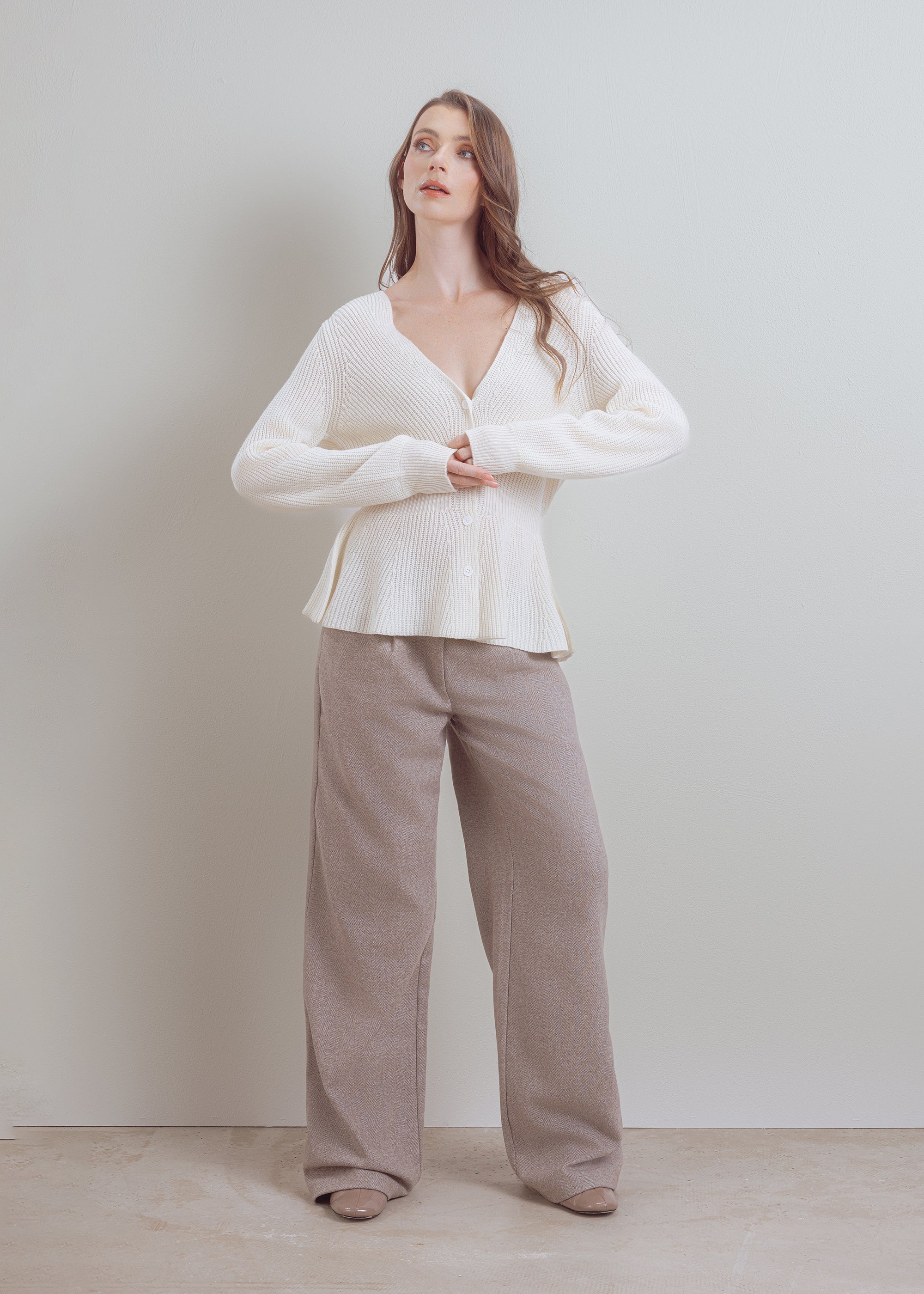 Wool cardigan with peplum