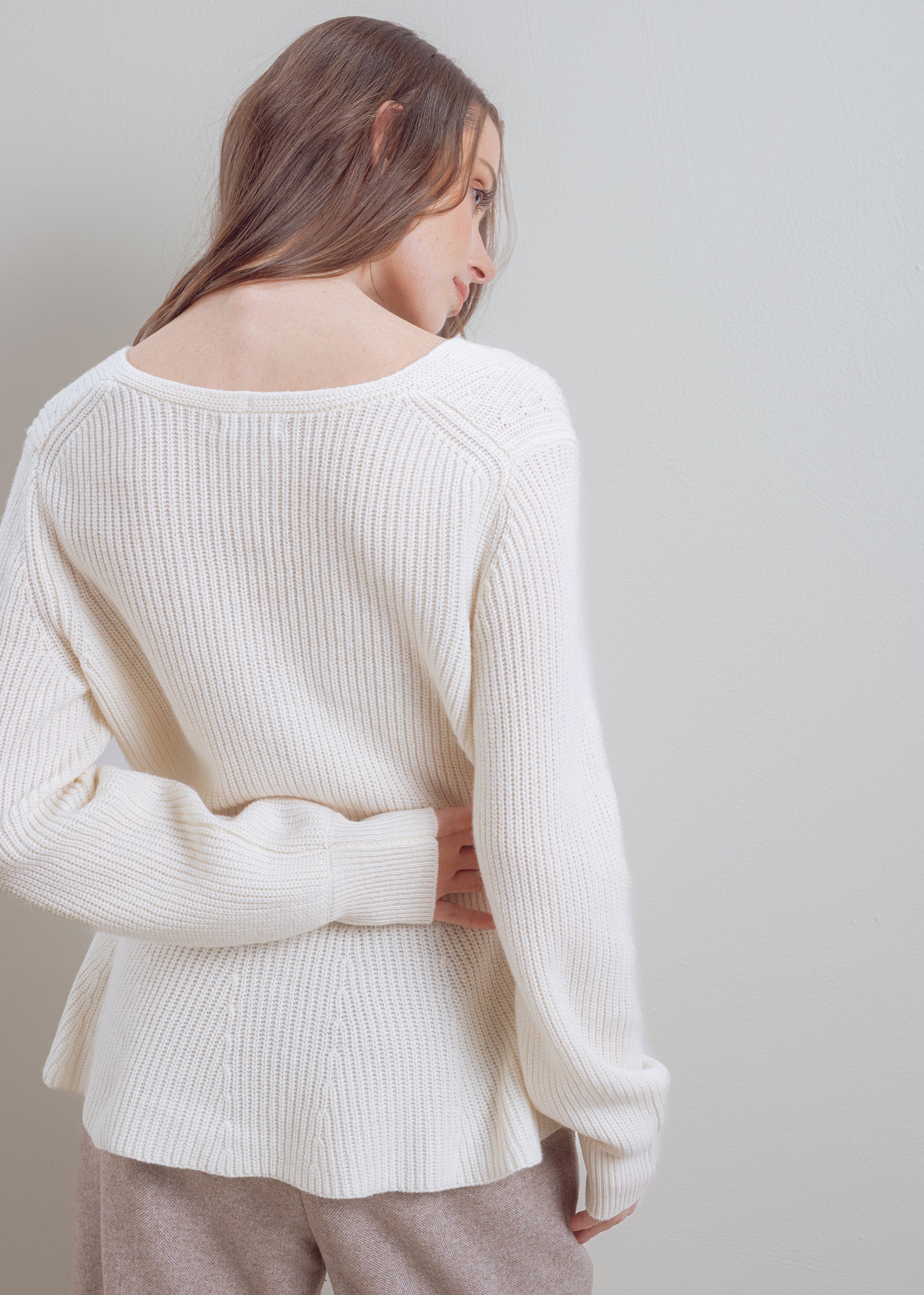 Wool cardigan with peplum