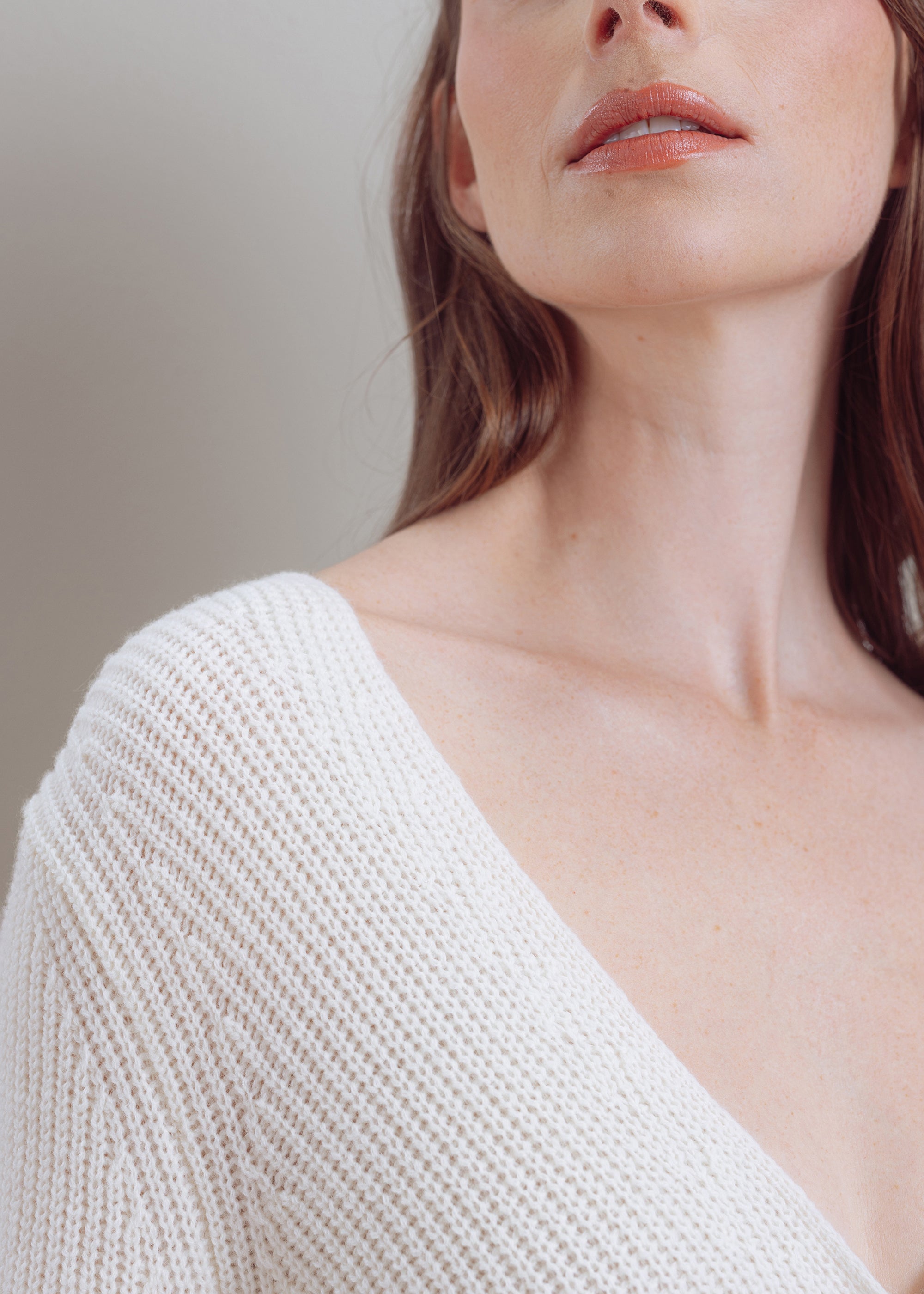 Wool cardigan with peplum
