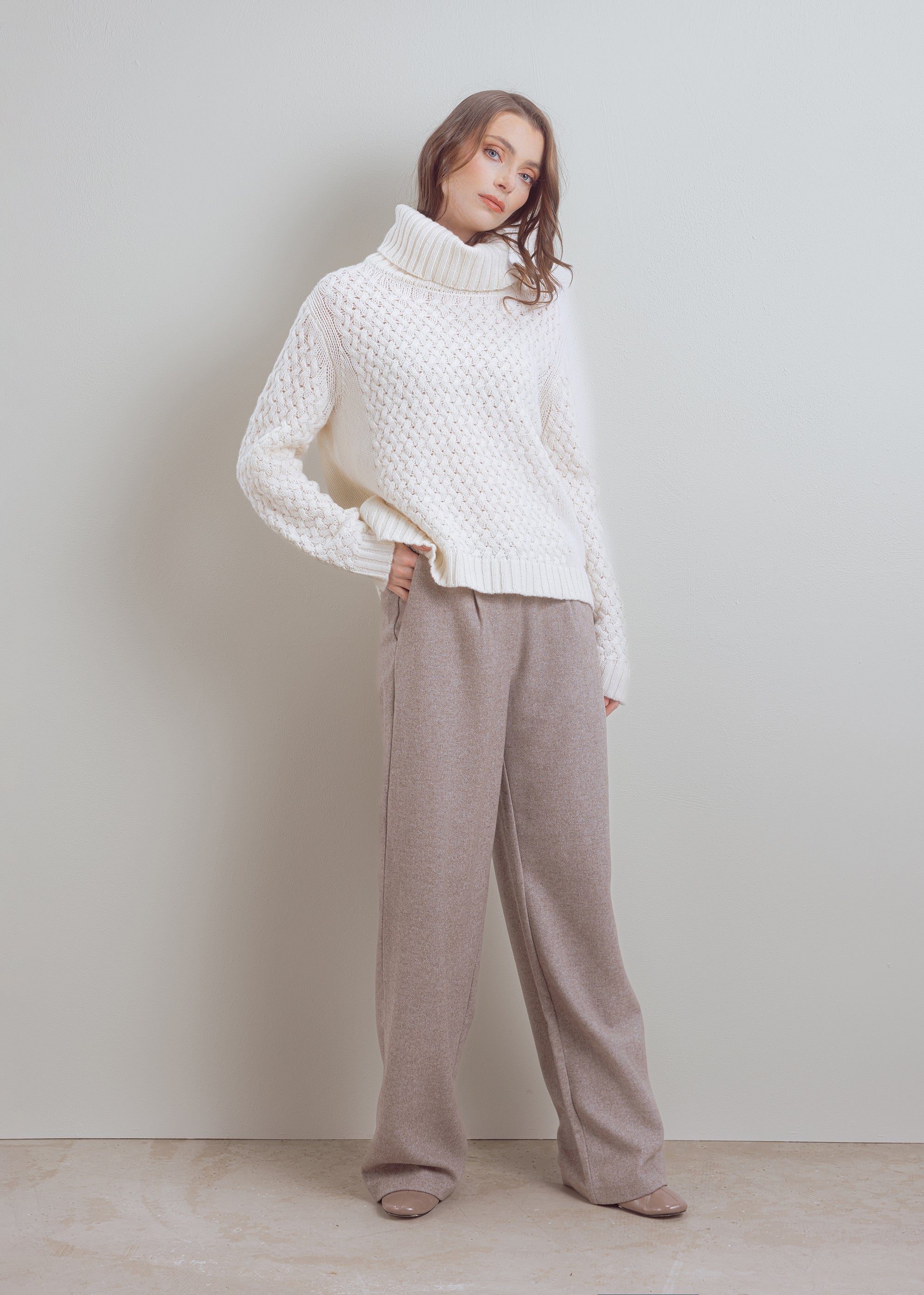 Turtleneck sweater with cable pattern made of pure wool