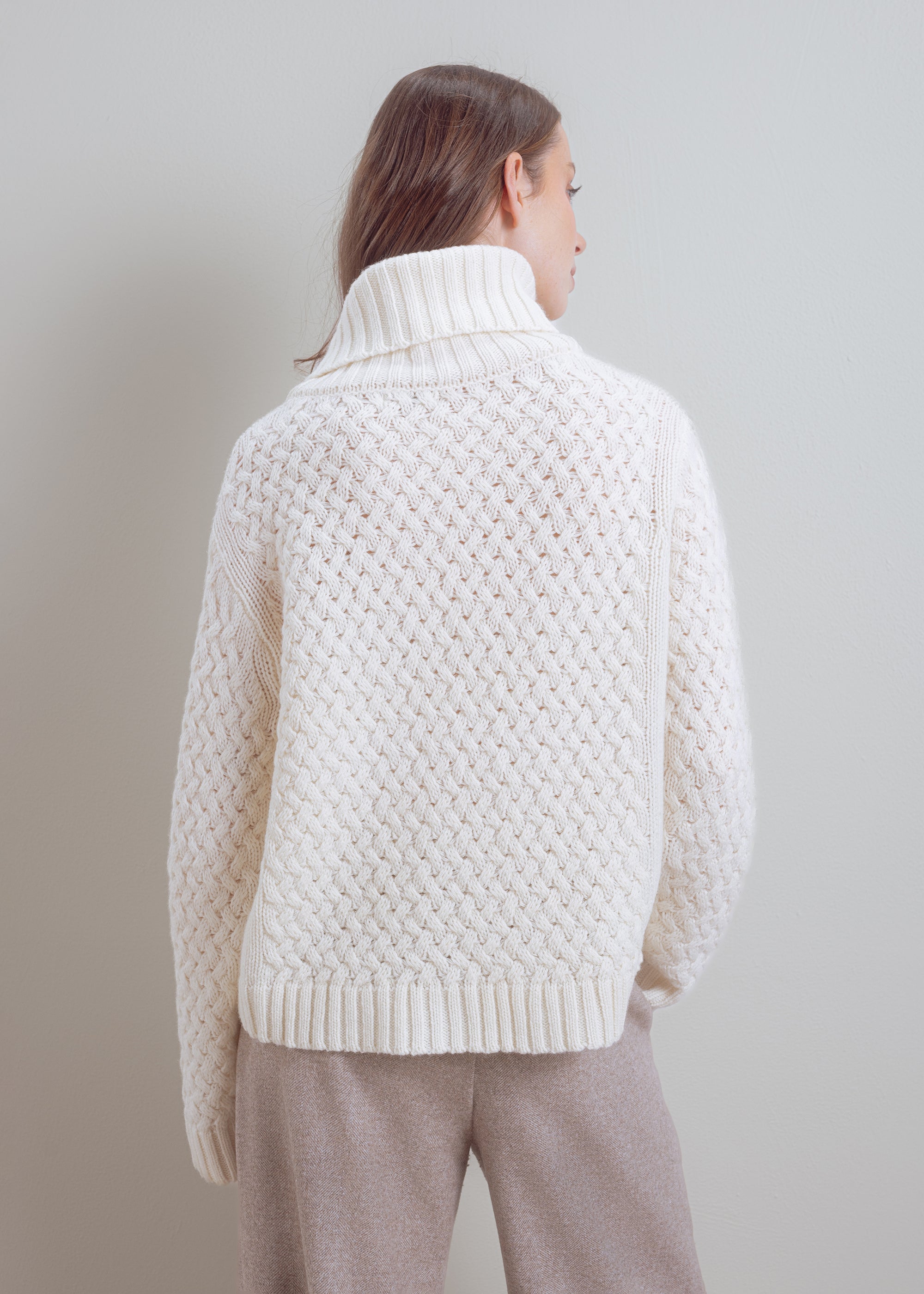 Turtleneck sweater with cable pattern made of pure wool