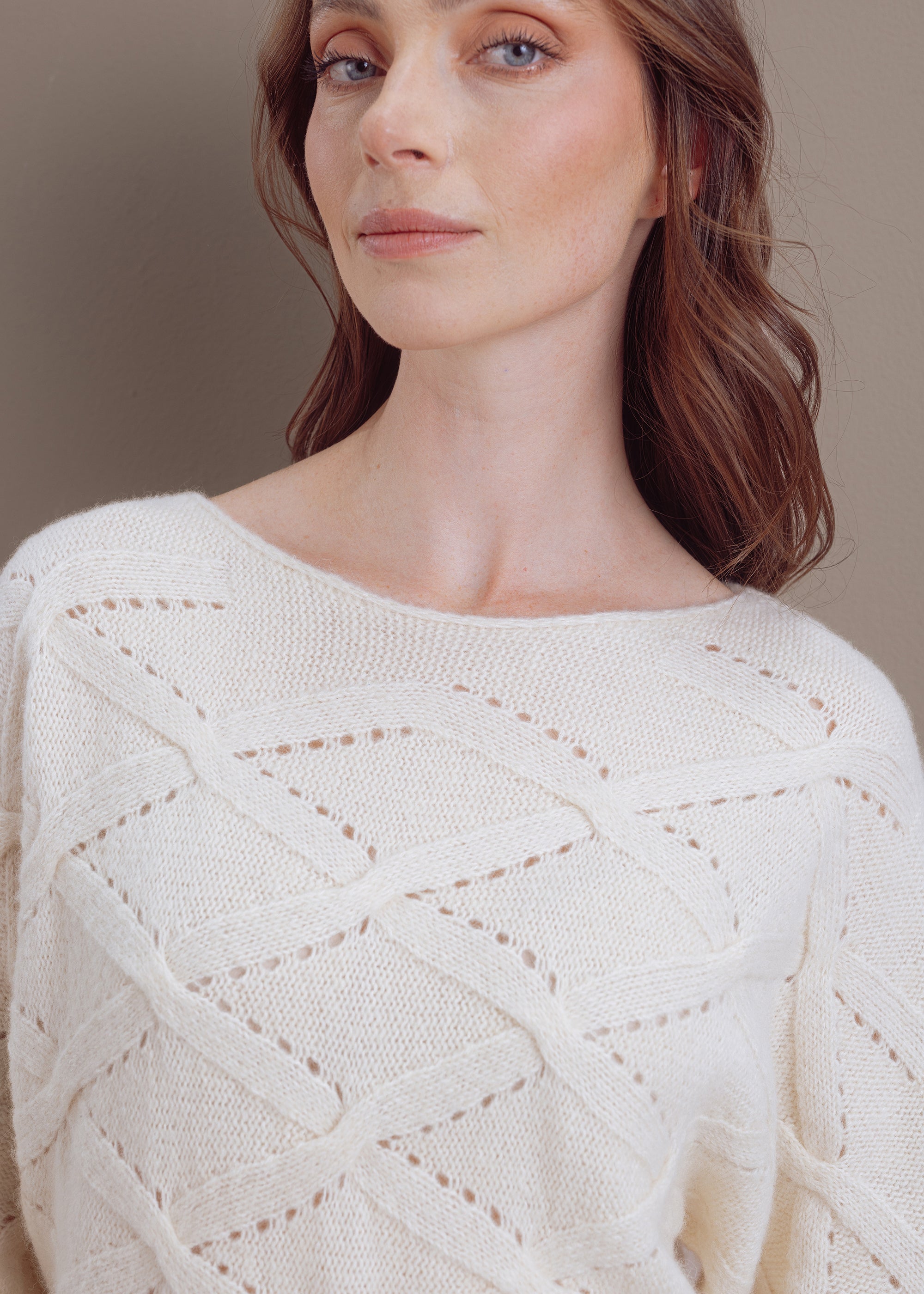 Ajour sweater with knitted pattern made of wool-cotton mix
