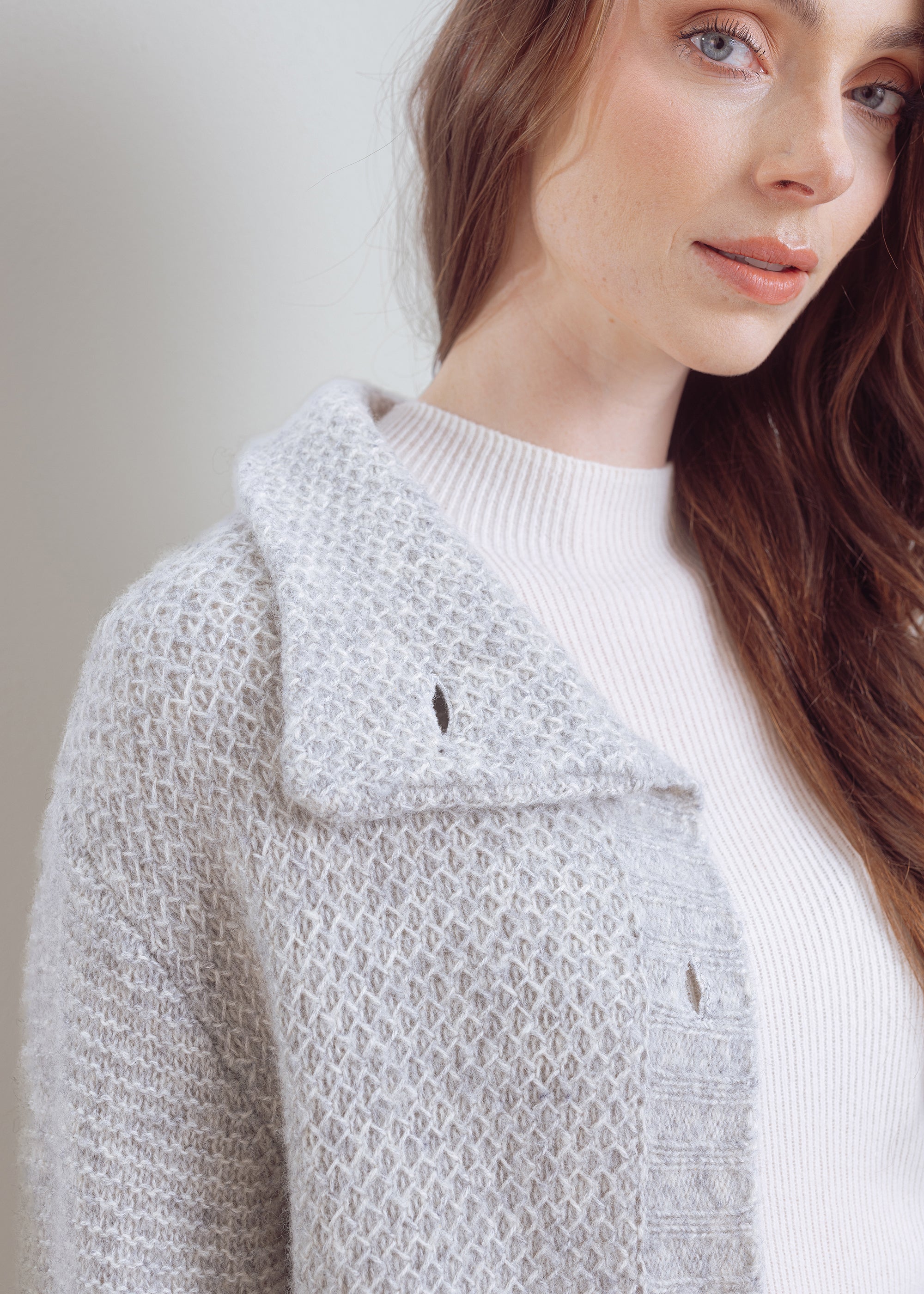 Knitted coat in structured knit made of wool-cotton mix