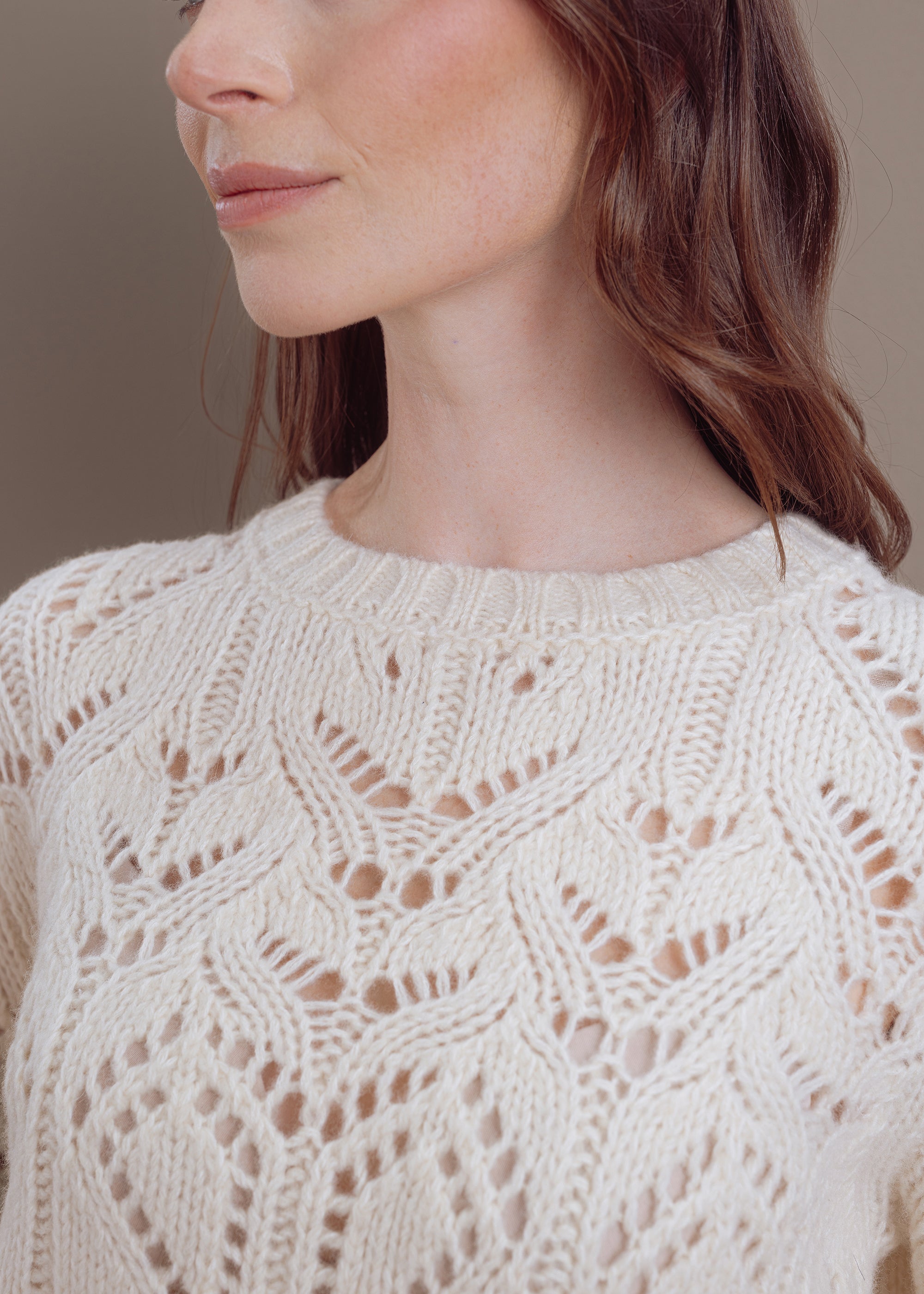 Ajour sweater made of wool-cotton blend