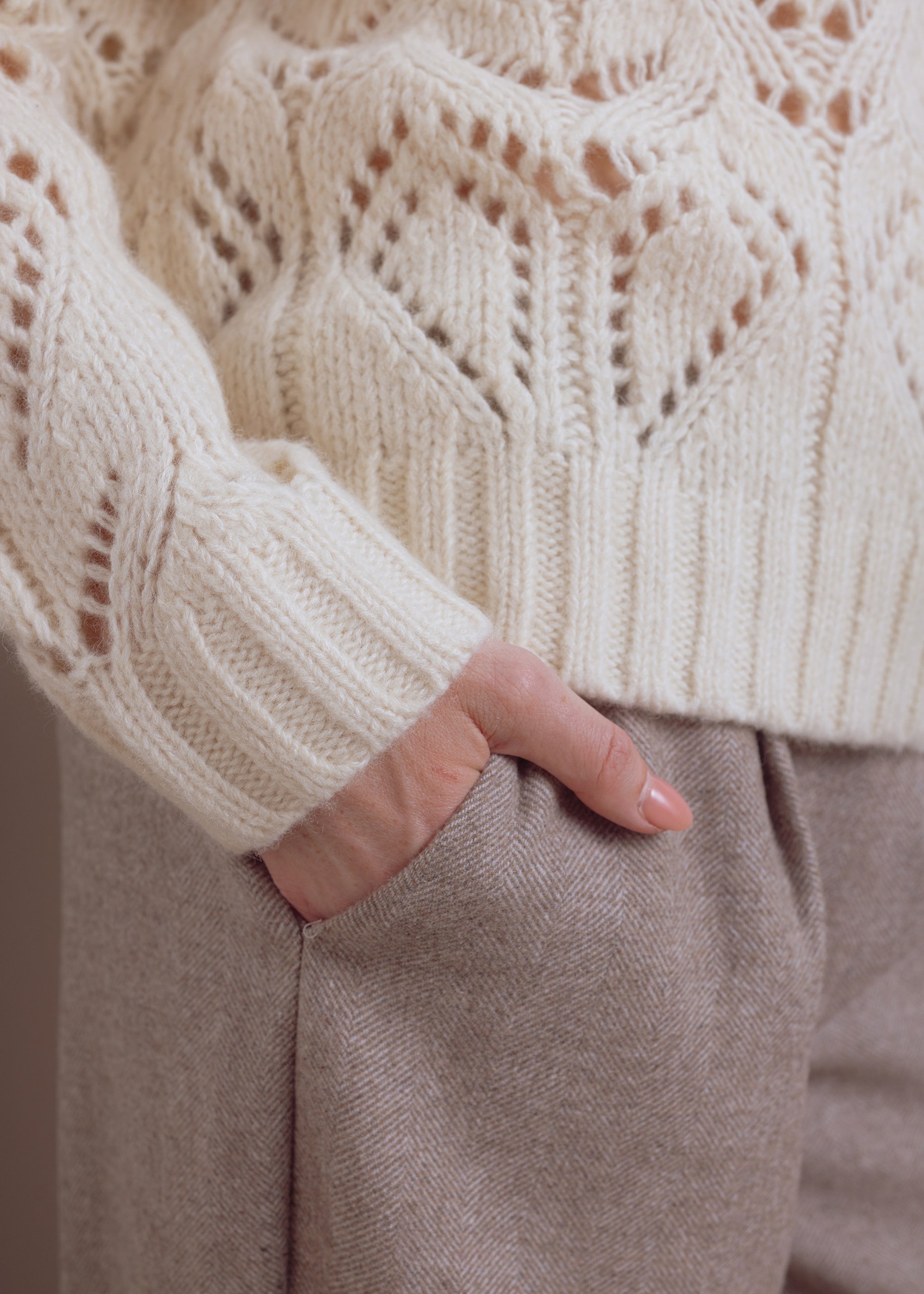 Ajour sweater made of wool-cotton blend