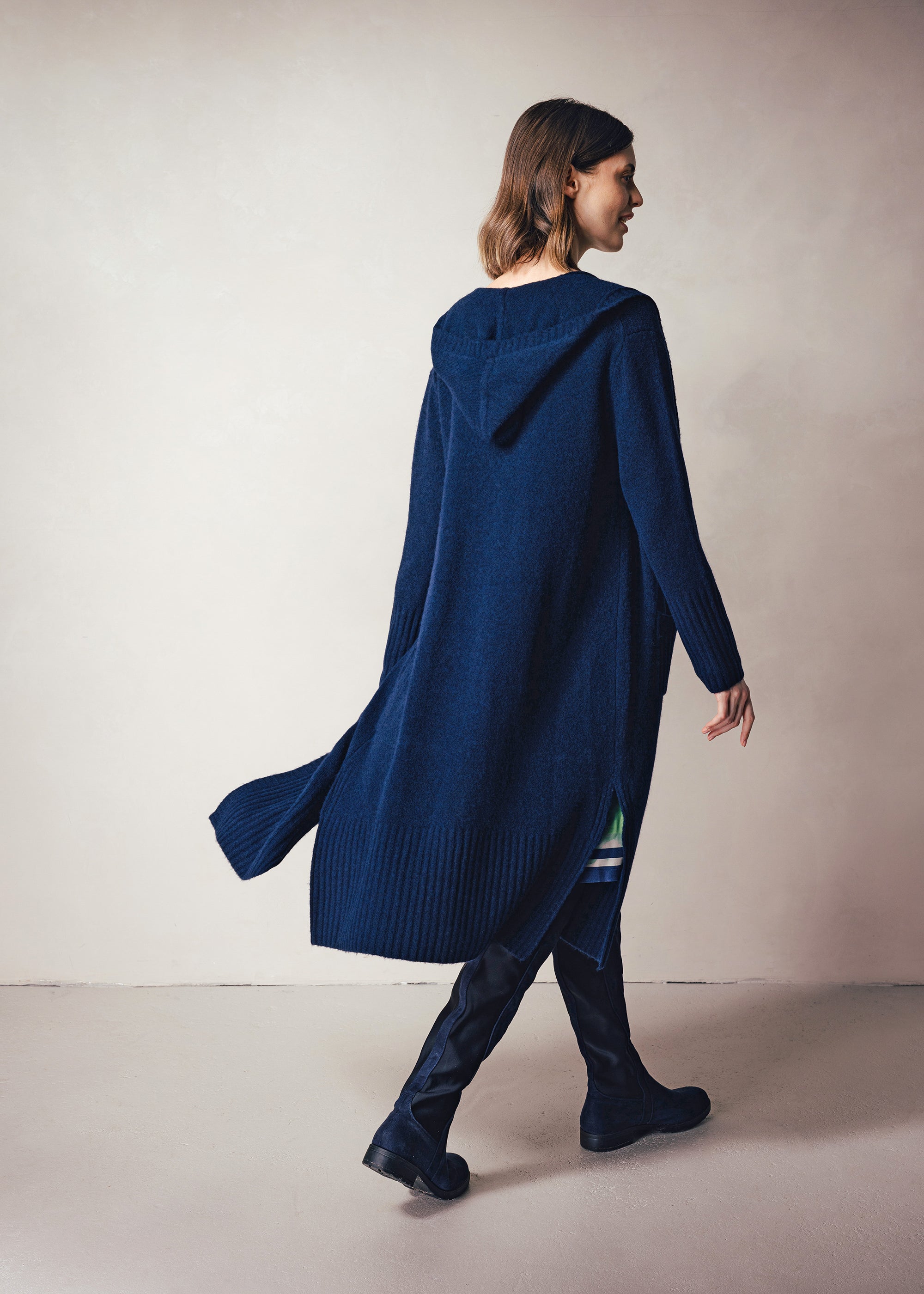 Long knitted coat with hood made of wool mix