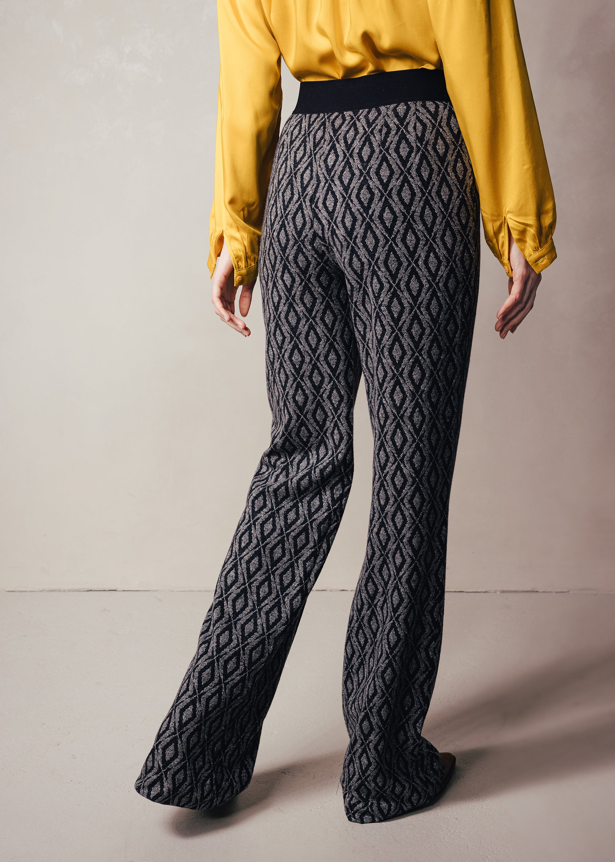 Jersey jacquard trousers with geometric pattern