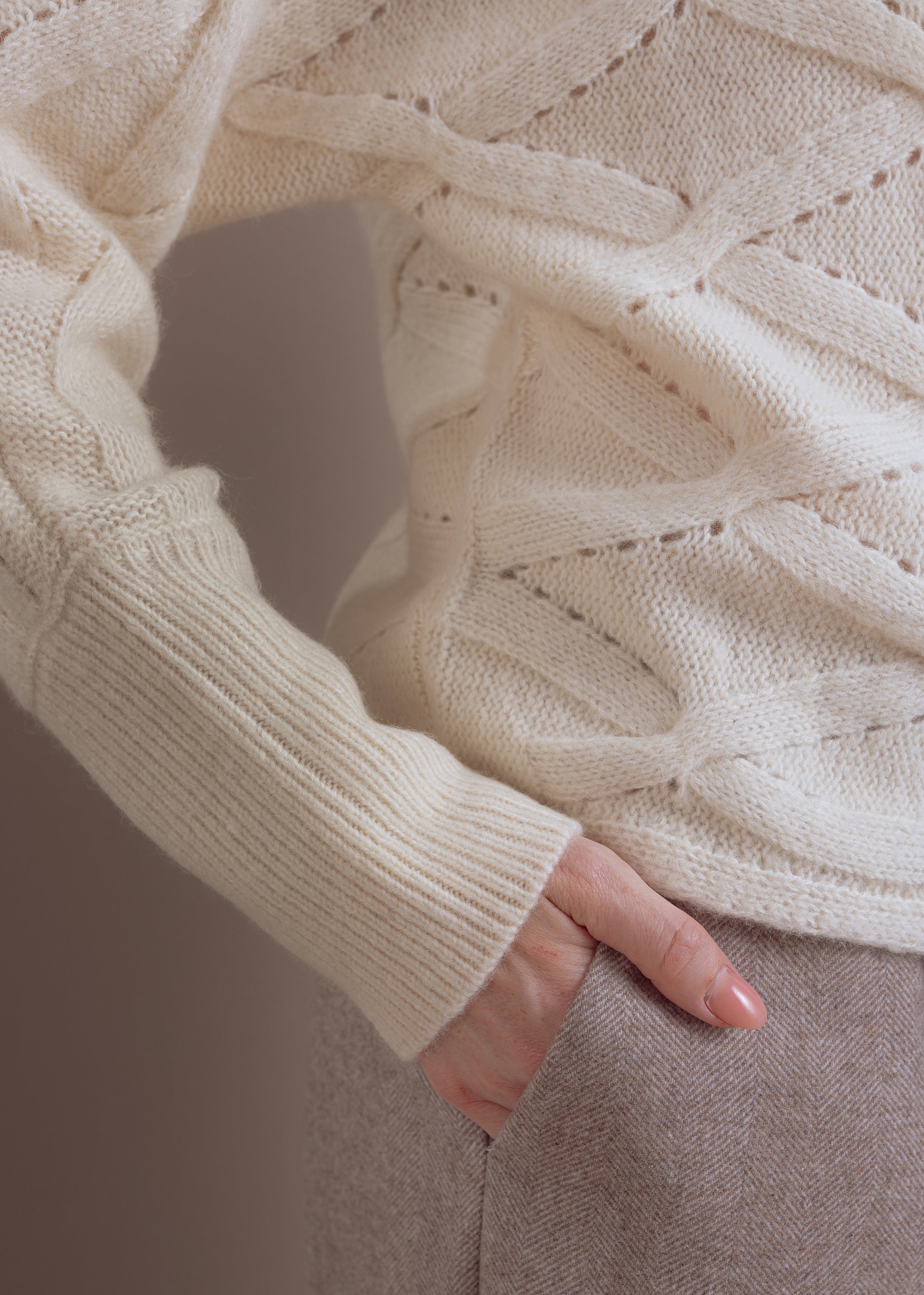 Ajour sweater with knitted pattern made of wool-cotton mix
