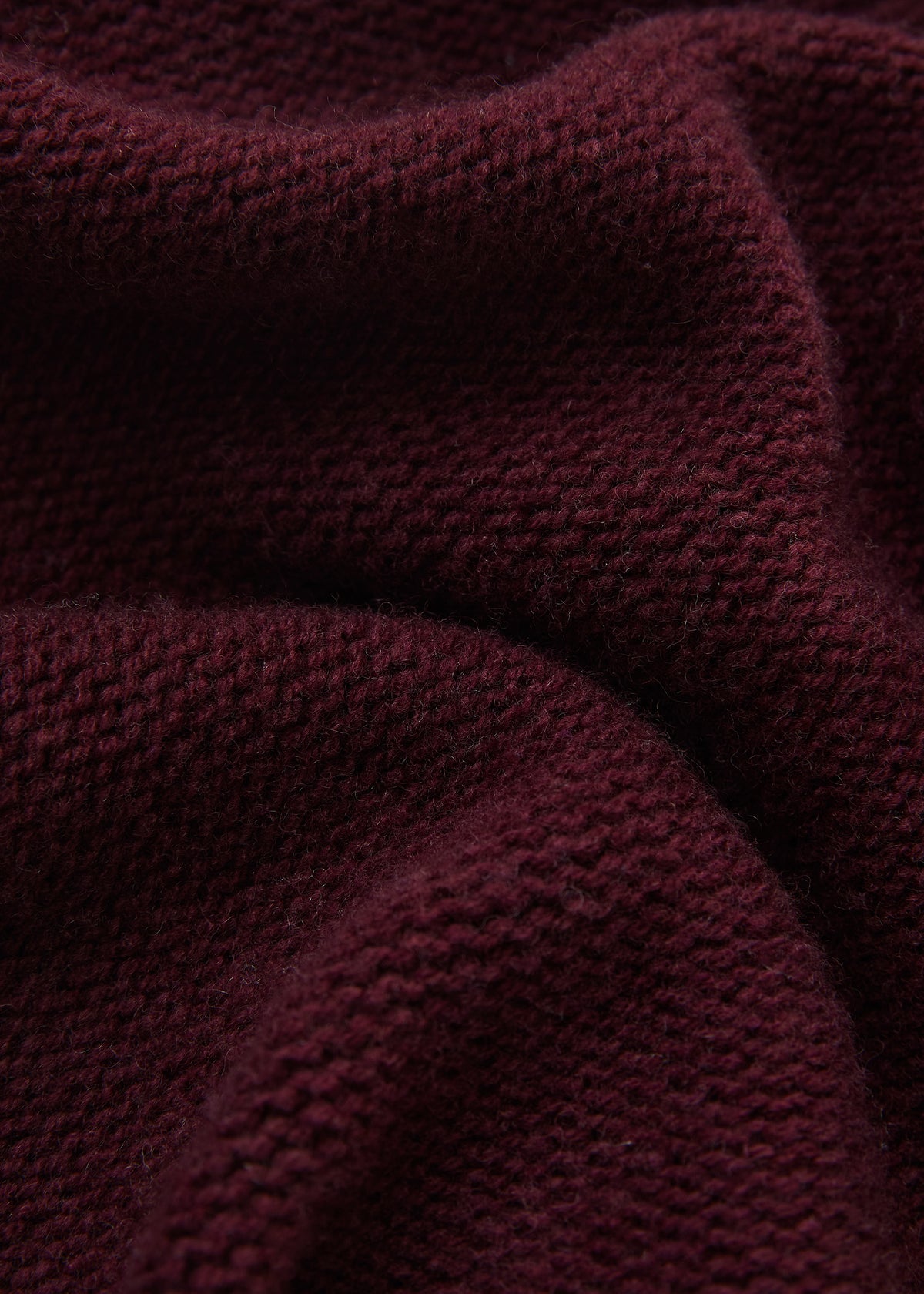 Rollkragenpullover mit Fransensaum